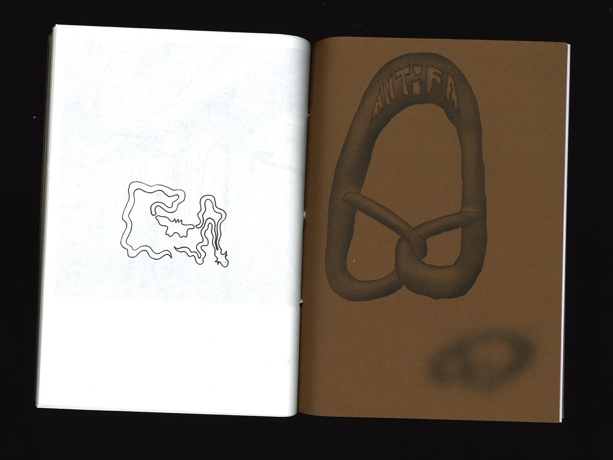 spread of a small doodle, and the "antifa pretzel" poster.